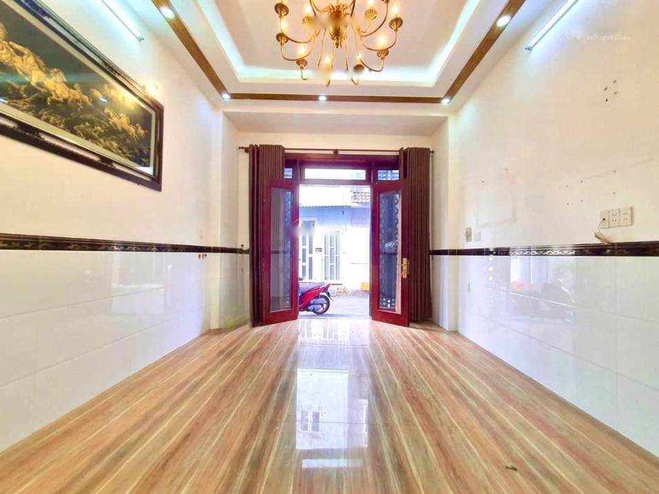 Cần bán gấp nhà sổ riêng 4 tầng, 51 m2, mặt tiền 4m tại Đường Ni Sư Huỳnh Liên, giá 8,2 tỷ